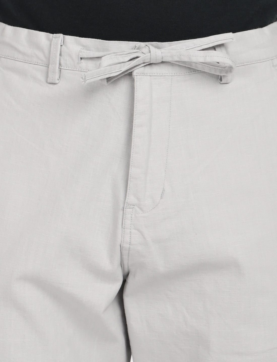 Light grey linen blend trouser featuring a tie waist detail, perfect for casual and dressy occasions.