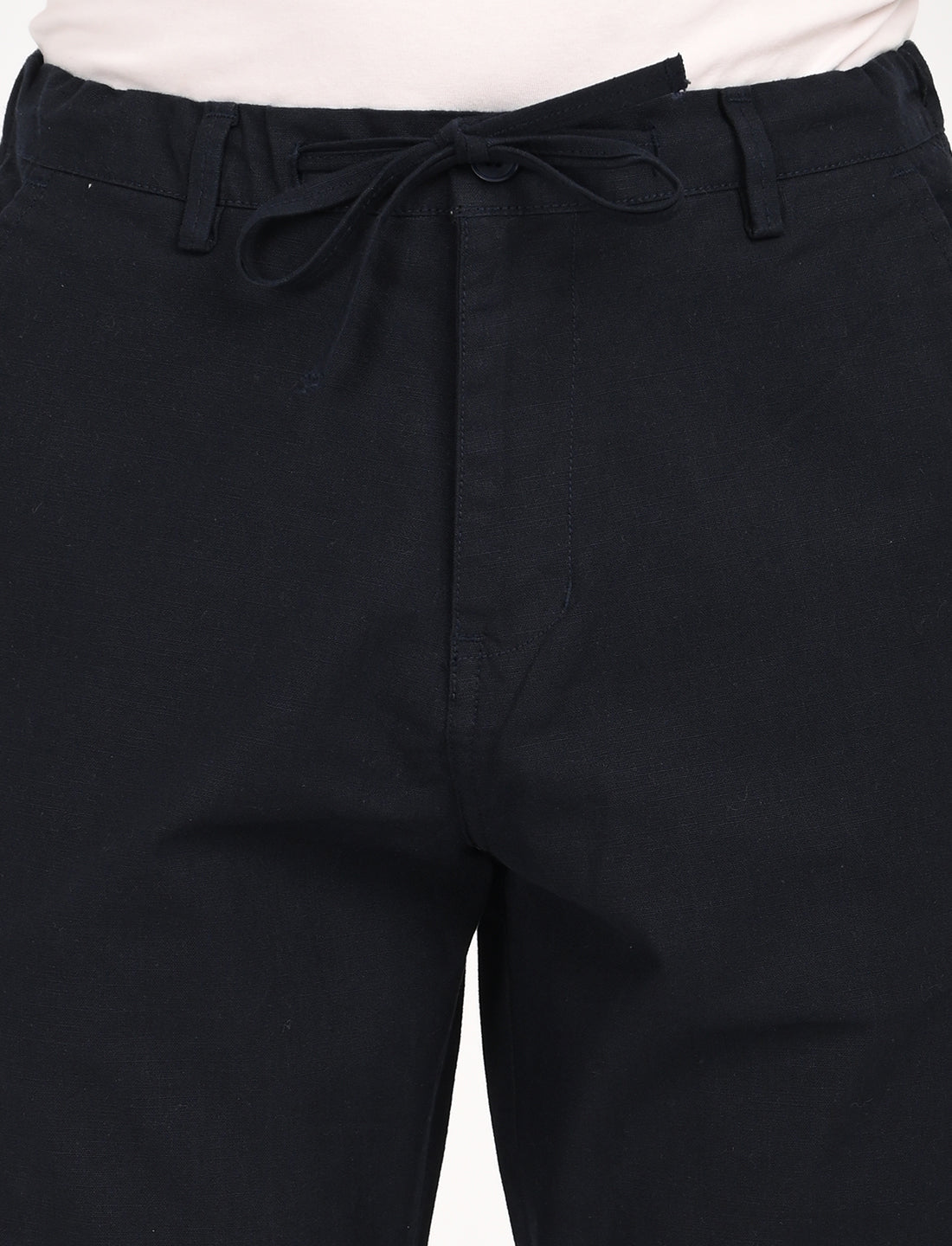 Close-up of Nova navy blue linen blend trousers with drawstring waist for casual and street wear.